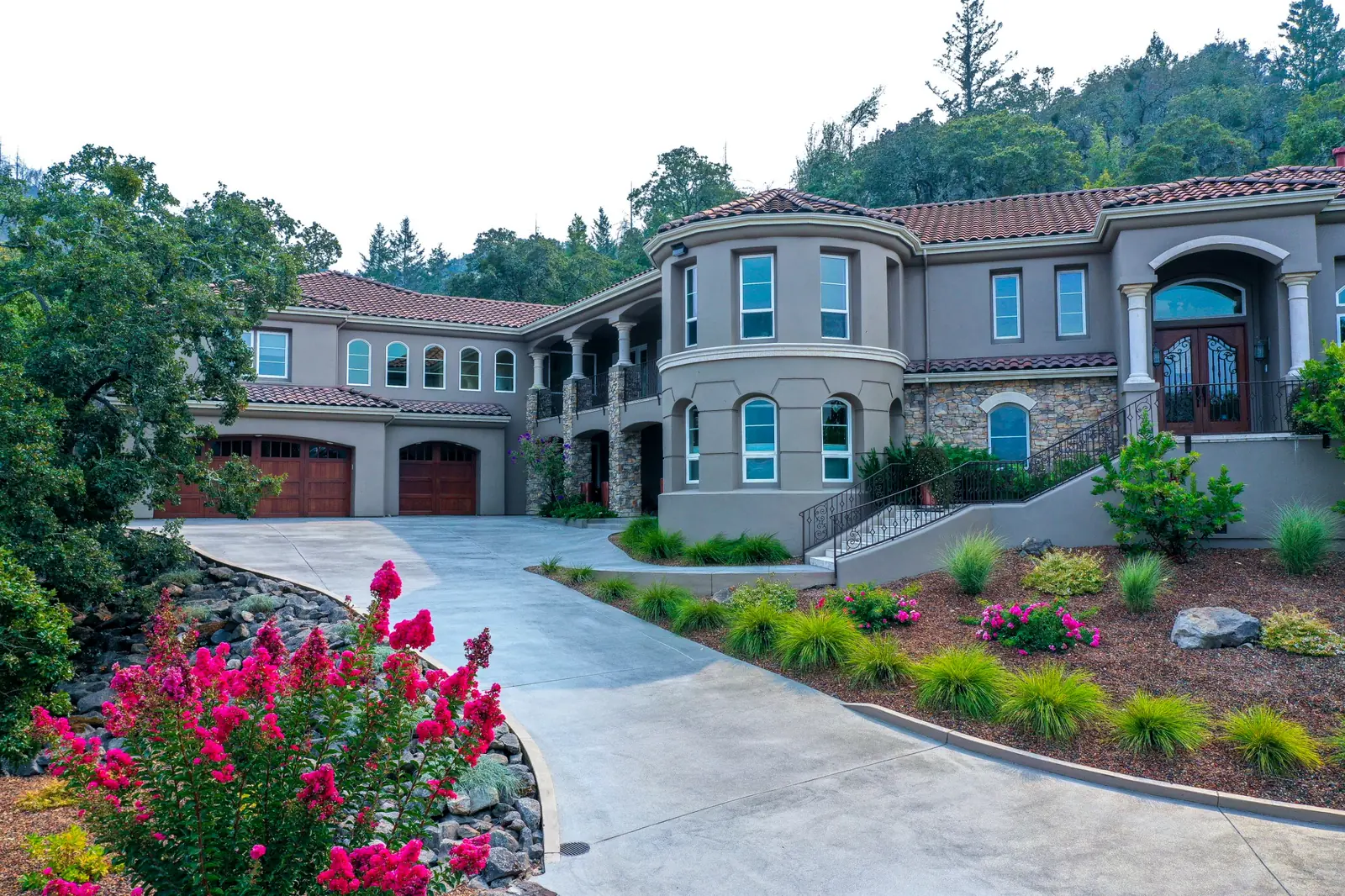 Services Hero Stucco Estate Curved Driveway
